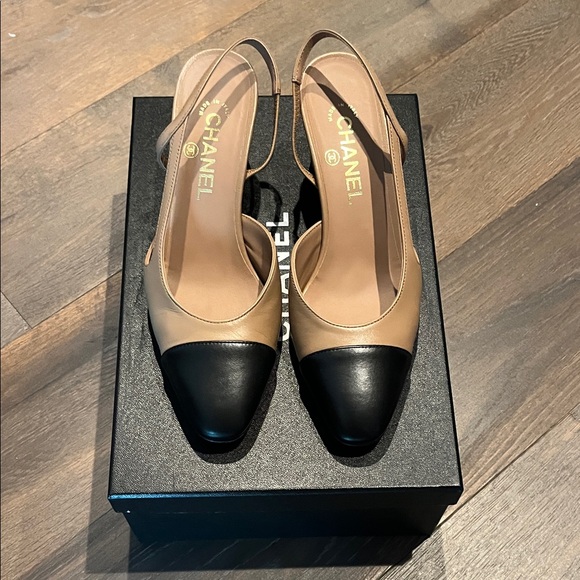CHANEL Shoes - CHANEL Black and Tan Cap Toe Heels